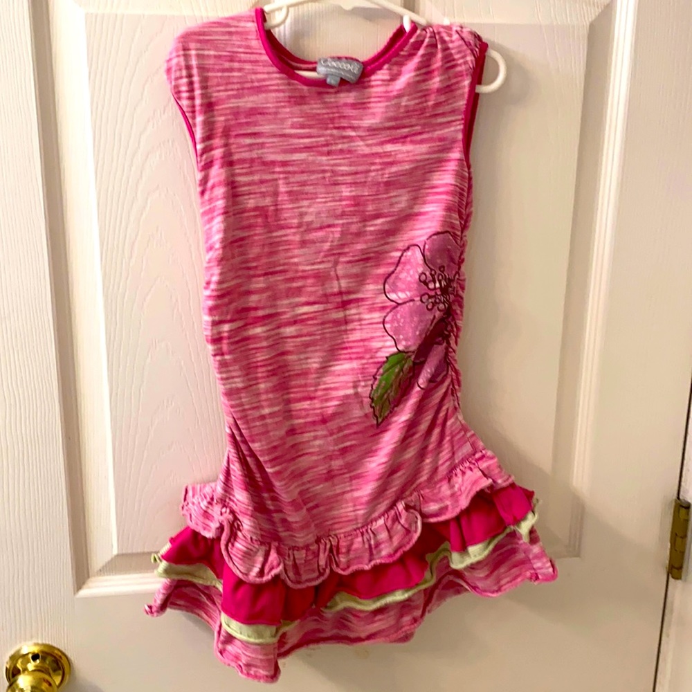 Super fun dress with ruffles and ruching.